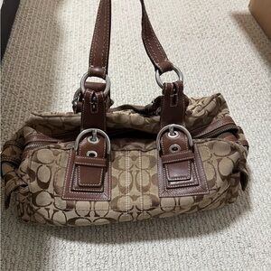 Coach Beige Signature Shoulder Bag with Leather Trim. Too zip. 2 side pockets